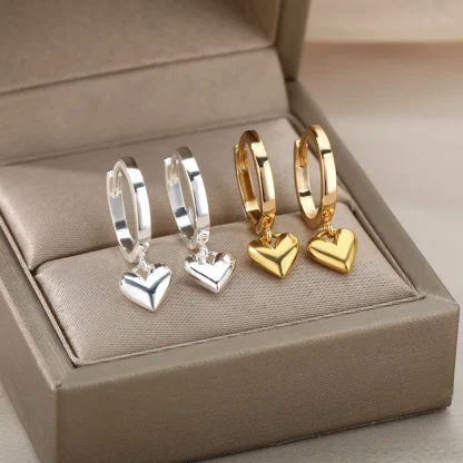 Elegant Lux Earrings with Pearl-like Charm - Image 14